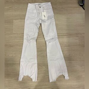 White ripped flares jeans